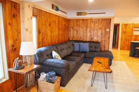Living Room- Sink into the cozy couch after a day on the lake.