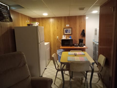 Basement Level Kitchenette 
Dryer only No Washer
open concept Living room area