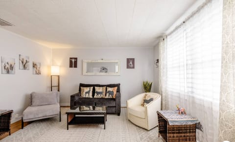 Homey and comfy living room where you and your family can relax and watch TV