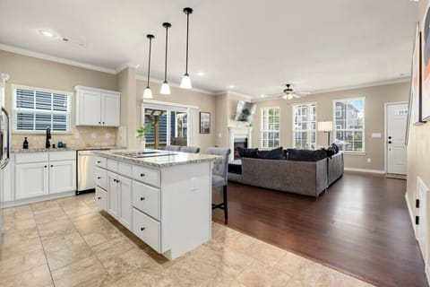 Through the living room, you'll see our kitchen.