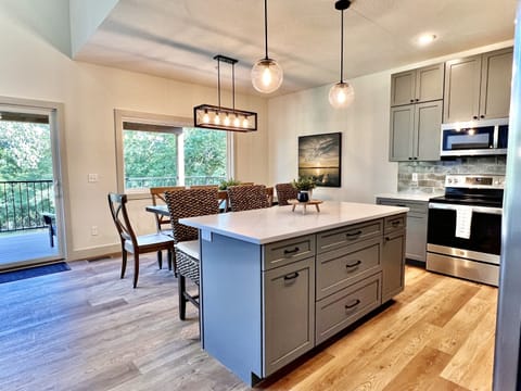 Lovely open kitchen and dining space with everything you will need except food!