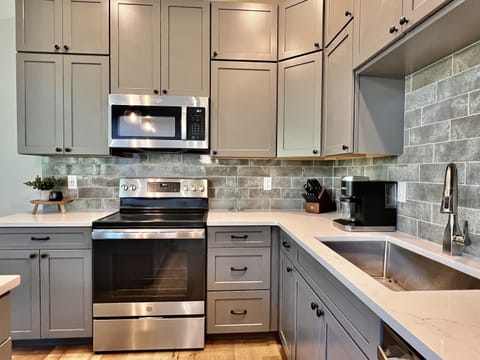 Beautiful open kitchen will all your baking and cooking needs!