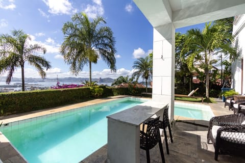 VILLA verandah and pool overlook Rio Harbour & SUGARLOAF.