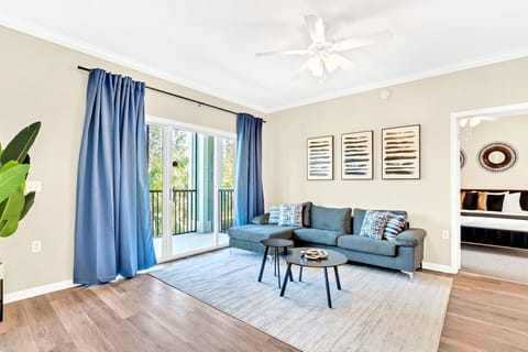 Living room with smart TV and direct patio access