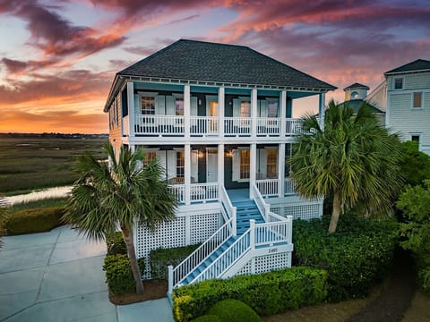 Your beach vacation home is waiting for you silently in the sunset
