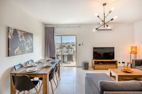 Basic Apartment, Multiple Beds | Living area | TV