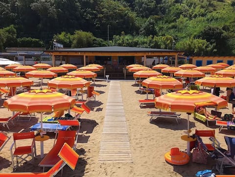 Private beach, white sand, free beach shuttle, sun loungers