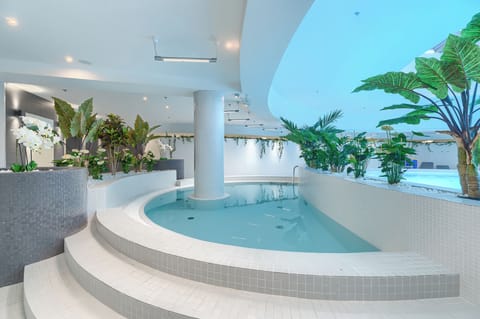 Indoor pool, open 7:00 AM to 10:00 PM, free cabanas, sun loungers