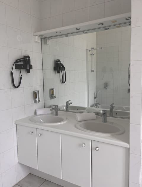 Hair dryer, towels, soap, shampoo