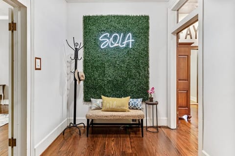 Take a picture with our selfie wall before going out on the town.