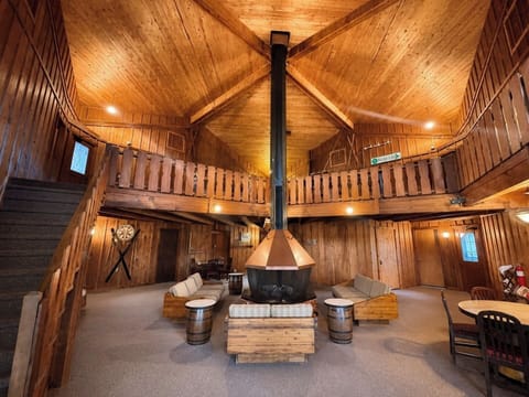 Cozy rustic cabin indoor lodge common area