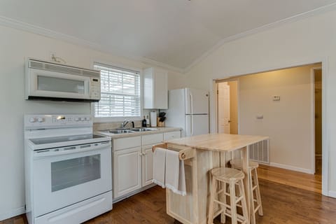 Make sure to look in the cupboards of the kitchen island! We used it for storing some of those kitchen basics
