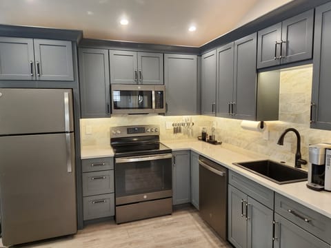 Crate & Barrel dishes, pizza sheet, utensils, food storage, olive oil, sweetener