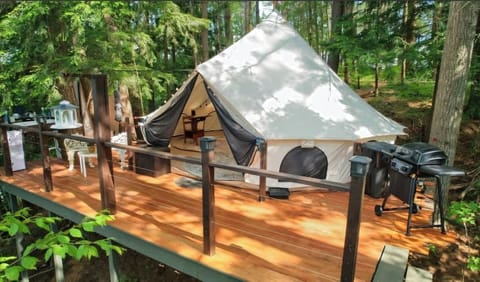The Front deck of the tent has plenty of space for lounging, eating and BBQ  All with a view!