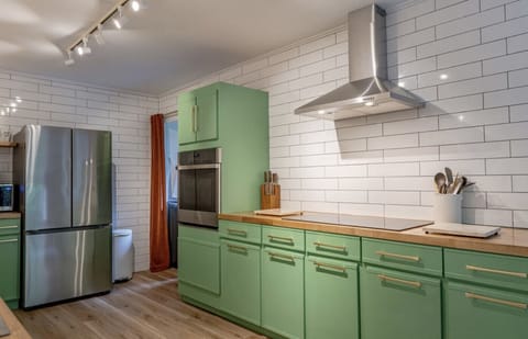 Kitchen includes new stainless steel appliances