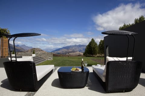 Outdoor lounger with mountain views