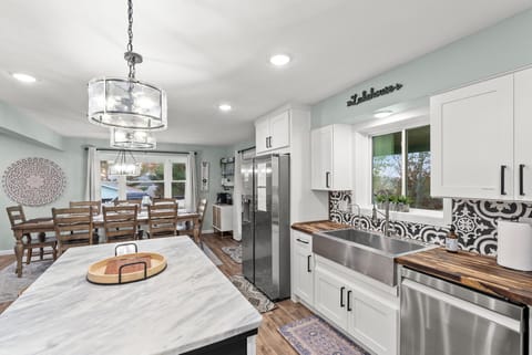 Kitchen stainless steel large and deep bowl sink with garbage disposal. Also a purified water faucet