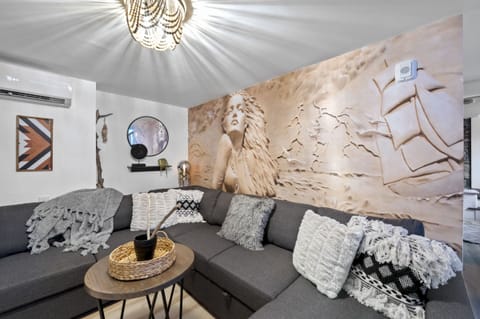 Cozy and uniquely designed living room space on the lower level
