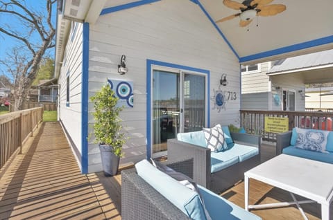 Relaxing colorful porch with unobstructed view of the lake