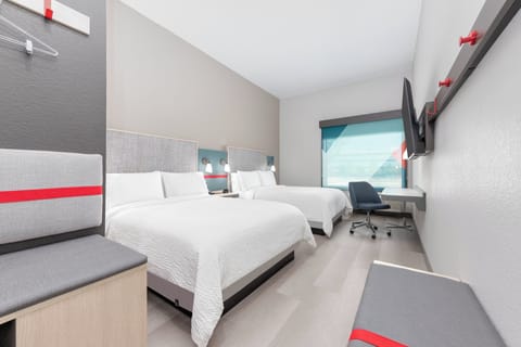 Desk, laptop workspace, blackout drapes, free cribs/infant beds