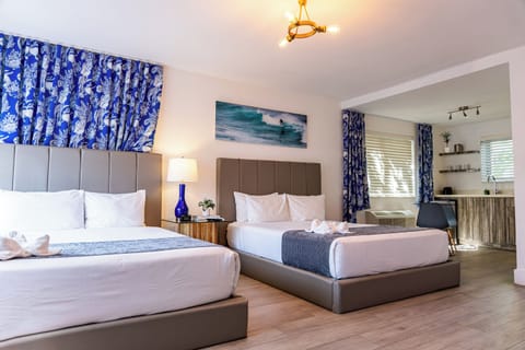 Accessible Studio Double Queen | Premium bedding, memory foam beds, in-room safe, laptop workspace