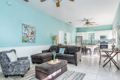 The open floor plan keeps everyone connected while enjoying different activities.