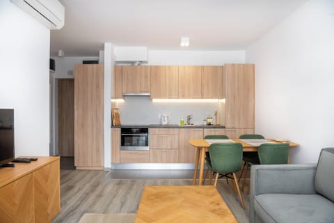 Deluxe Two-Bedroom Apartment with Balcony | Private kitchen | Full-size fridge, oven, stovetop, dishwasher
