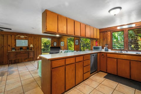 Kitchen is fully equipped with pots, pans and utensils