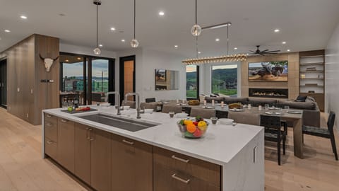 Spacious kitchen looking into dining area and great room