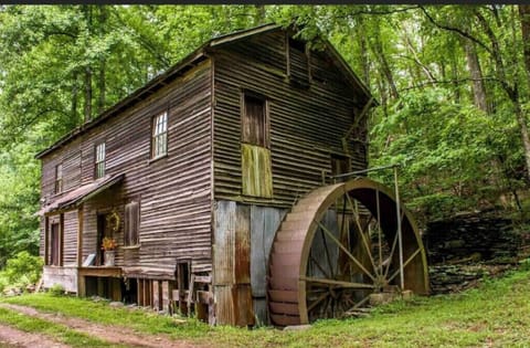 150+ year old grist mill greets you on your drive in.