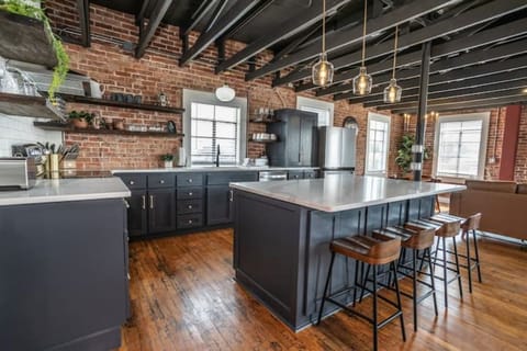 Kitchen island seats 4 comfortably.