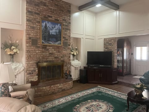 Large open living room with 55” smart tv