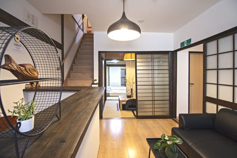 Deluxe Villa | Living area | 32-inch flat-screen TV with cable channels