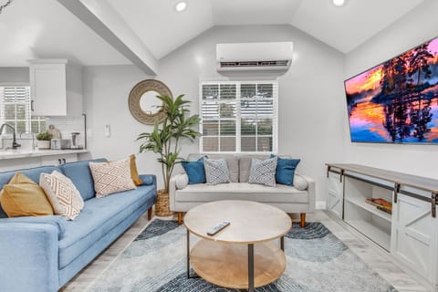 Relax in this cozy living room featuring comfortable seating