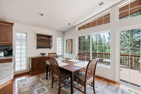 Enjoy a meal in the dining area where you will find a dining table with seating for 4 tucked next to the large windows.