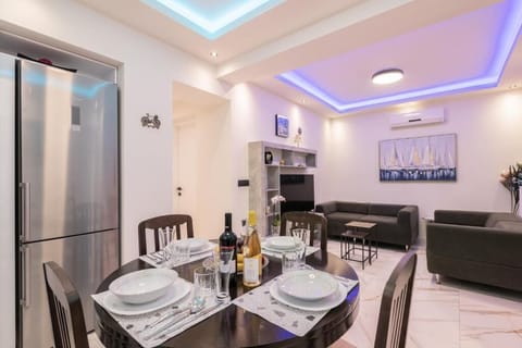 Basic Apartment | Living area | 40-inch Smart TV with satellite channels