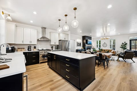 The open-concept design makes this space ideal for reconnecting with friends and family while preparing a meal together!
