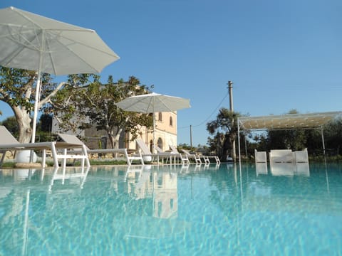 Seasonal outdoor pool, an infinity pool, sun loungers