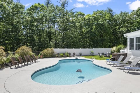 Gunite pool with new plaster, tile and large expanded patio installed in 2026