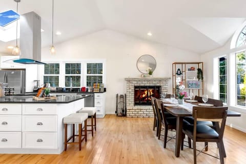 After you enter the front door, you will see a open concept kitchen and a formal dinning table next to it