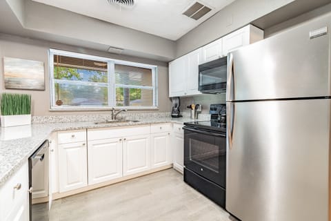 Fully equipped with high-quality appliances, it’s perfect for both light meals and elaborate feasts.