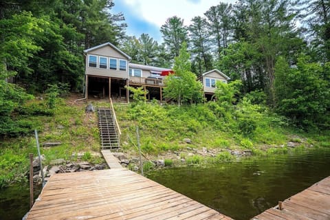 Majestic Rear of Cabin positioned on shore overlooking Indian River and Dock!!