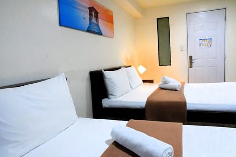 Family Room, Multiple Beds, Non Smoking | Desk, free WiFi, bed sheets