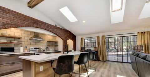 This inviting kitchen was remodeled with guest in mind. Open shelving makes everything easy to find.