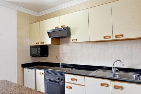 Full-size fridge, stovetop