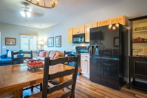 Nice black appliances. Refridgerator has water and ice in the door.