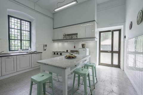 Villa | Private kitchen | Full-size fridge, microwave, oven, stovetop