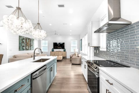 Azure's open concept kitchen ensures that the family chef is included in the fun