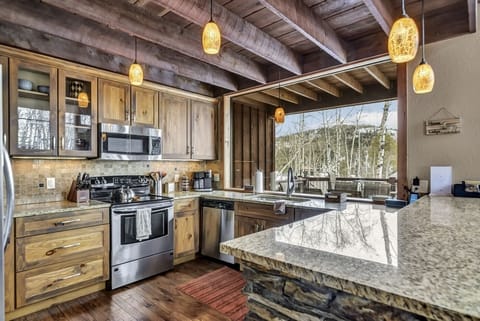 Kitchen with the biggest window over the sink you could imagine! 