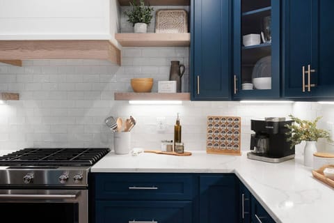 It's all here! Cooking utensils, pots, pans, serving dishes, lovely white dinnerware, salt, pepper, oil, select herbs and spices, coffee/tea bar with a Keurig coffee maker that can make single k-cups or a pot of your own favorite ground coffee.